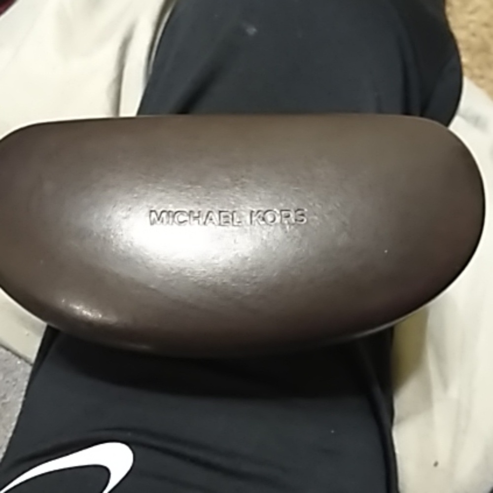 3 Michael kors watch cases and 1 Glasses case